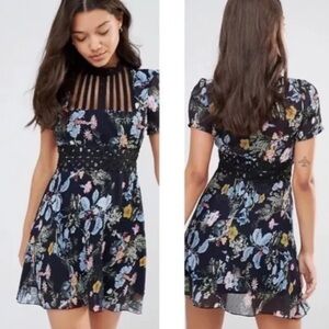 Anthropologie Foxiedox Blue Dainty Floral Pleated Chiffon
Mini Dress